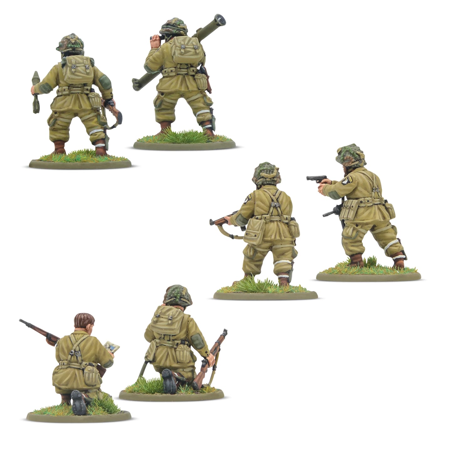 Set of six miniature soldiers in military uniforms with weapons on a white background