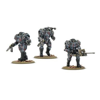 Three miniature figures in futuristic armor on a white background